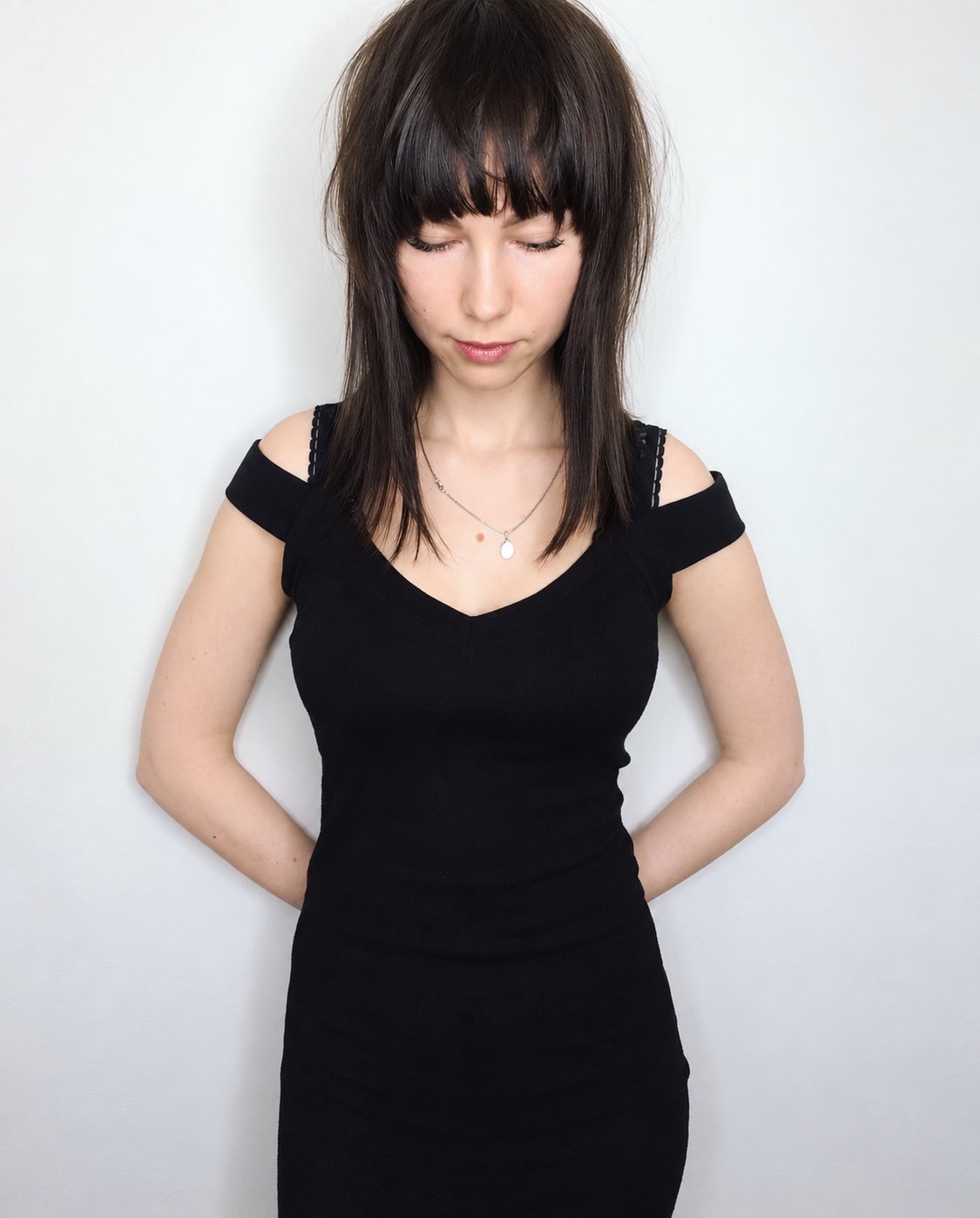 Layered haircut with fringe by Andrii Gerashchenko